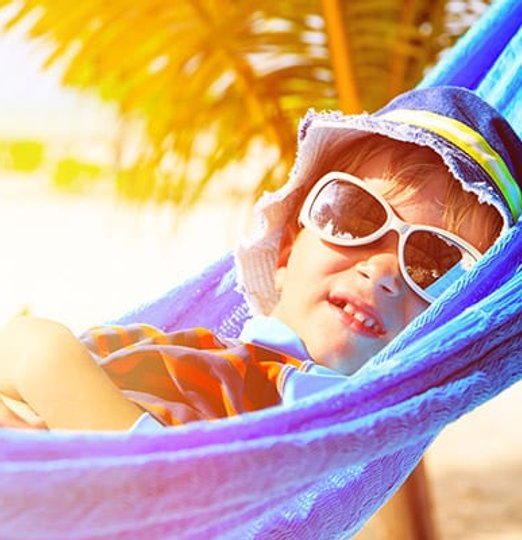 Little boy relaxing on summer vacation